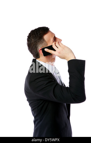 Side view portrait of a businessman talking on the phone Banque D'Images