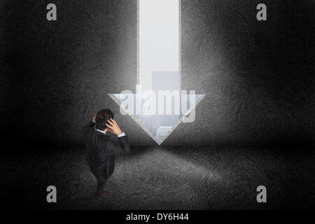 Composite image of businessman with hands on head Banque D'Images