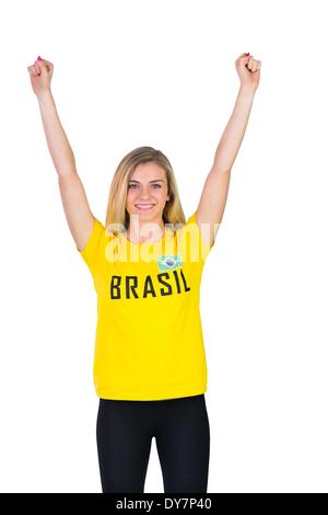 Football fan excité en tshirt brasil Banque D'Images