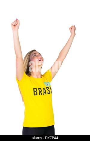 Football fan excité en tshirt brasil Banque D'Images