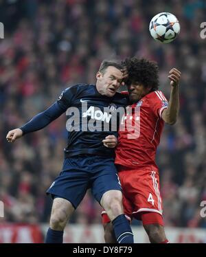 Munich, Allemagne, l'Allianz Arena. 09 avr, 2014. Quart de finale de la Ligue des Champions, deuxième jambe. Le Bayern Munich et Manchester United. Wayne Rooney (Manchester United FC) défis Dante (FC Bayern Munich) : Action de Crédit Plus Sport/Alamy Live News Banque D'Images