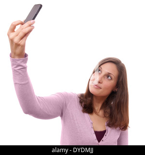 Jeune femme tenant un selfies Banque D'Images