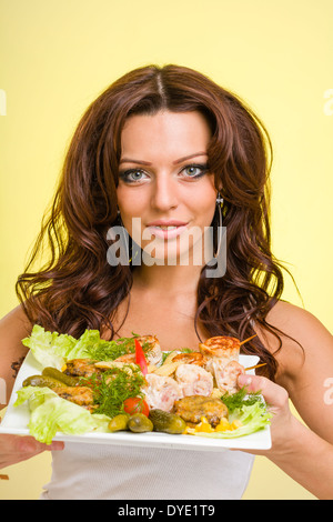 femme avec de la nourriture Banque D'Images