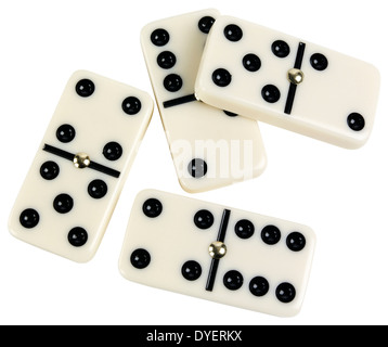 Quatre DOMINOS CUT OUT ON WHITE Banque D'Images