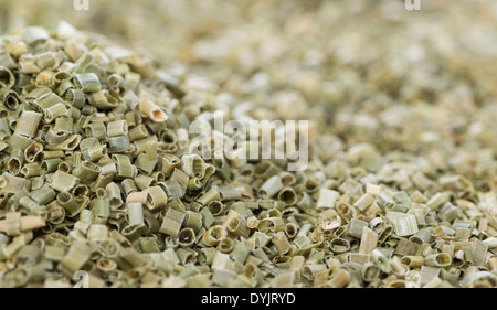 La ciboulette séchée de droit pour l'utilisation d'arrière-plan ou comme texture Banque D'Images