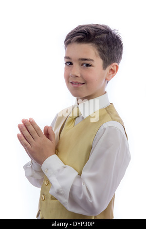 Un jeune garçon à célébrer sa Première Communion Banque D'Images