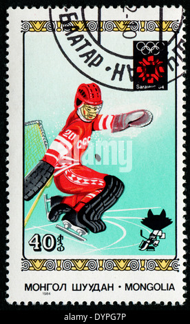 Mongolie - circa 1984 : timbre imprimé en Mongolie montrant le hockey, Jeux Olympiques de Los Sarajevo, version 1984, Banque D'Images