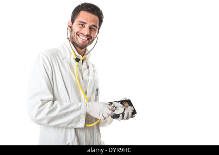 Un médecin/Technicien en portant un sarrau et un disque dur holding stethoscope Banque D'Images