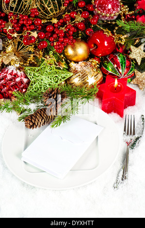 Christmas place setting table decoration en rouge et or. Banque D'Images