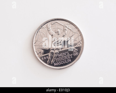 Un quart (25 cents) décrit d'or aux Jeux Olympiques de 2002 du Canada au hockey masculin. Banque D'Images