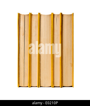Pile de livres d'occasion livres reliés avec du jaune sur fond blanc Banque D'Images