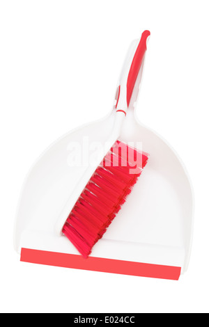Pelle et brosse sur un fond blanc Banque D'Images