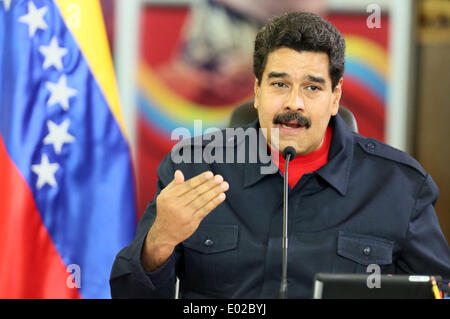 Caracas, Venezuela. Apr 29, 2014. Le Président du Venezuela, Nicolas Maduro prononce une allocution lors d'une conférence avec les membres de la classe ouvrière dans le palais de Miraflores à Caracas, Venezuela, le 29 avril 2014. Au cours de la conférence, il a traité de sujets tels que "la production, le développement et la construction d'un nouveau modèle socio-économique", selon la presse locale. © Alexander Gomez/AVN/Xinhua/Alamy Live News Banque D'Images