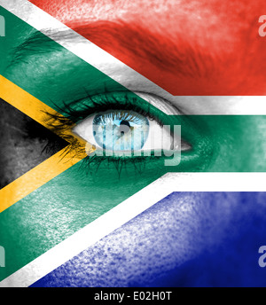 Visage peint avec pavillon de l'Afrique du Sud Banque D'Images