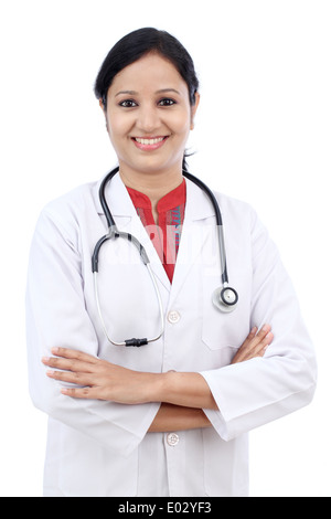 Cheerful female doctor with crossed arms Banque D'Images