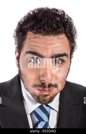 Portrait d'un handsome businessman making a face isolé sur fond blanc Banque D'Images