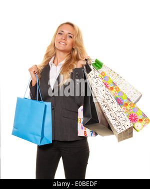 Woman shopping avec de nombreux sacs dans le plaisir, Frau beim Einkaufen mit vielen Einkaufstaschen hat Freude Banque D'Images
