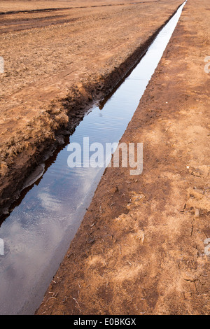 Une tourbière soulevée en cours de récolte de tourbe pour près de Douglas de l'eau dans les hautes terres du sud de l'Ecosse. Banque D'Images