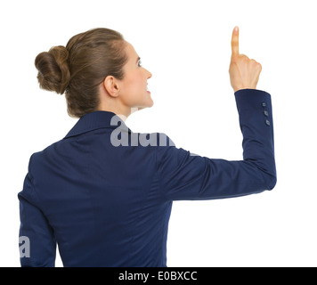 Femme d'affaires vers le haut sur l'exemplaire de l'espace. Vue arrière Banque D'Images