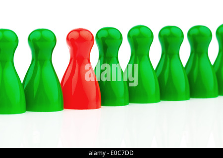 Les chiffres en rouge et vert jouer. Différemment dans l'équipe. Le taux de femmes dans l'emploi., Rote und gruene Spielfiguren. Anders im Team. Fra Banque D'Images