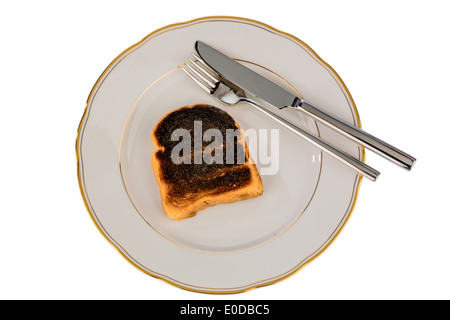 Griller le pain s'burntly. Burntly avec disques toast le petit-déjeuner., toasten Toastbrot wurde beim verbrannt. Banque D'Images