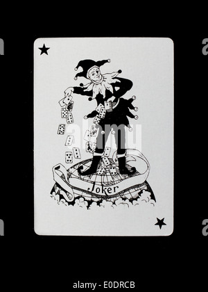 Ancienne carte à jouer (joker) isolé sur un fond noir Banque D'Images