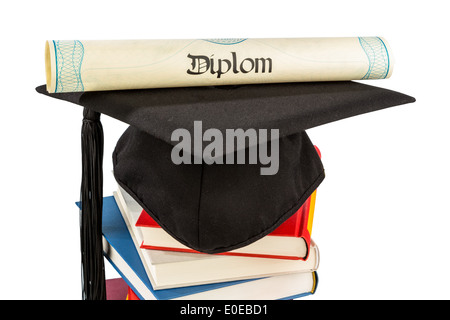 Une thèse de capuchon sur une pile de livres, photo symbolique pour l'éducation et de compétence, un Doktorhut Buecherstapel Symbolfoto auf einem, fu Banque D'Images