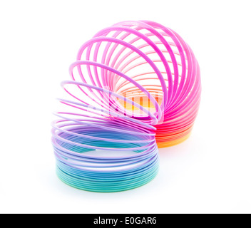 Jeu de ressort en spirale arc-en-ciel sur fond de bois Photo Stock - Alamy Jeu de ressort en spirale arc-en-ciel sur fond de bois Photo Stock - Alamy