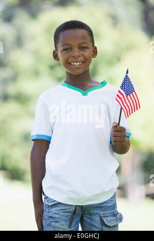 Little Boy Celebrating Independence Day in the park Banque D'Images