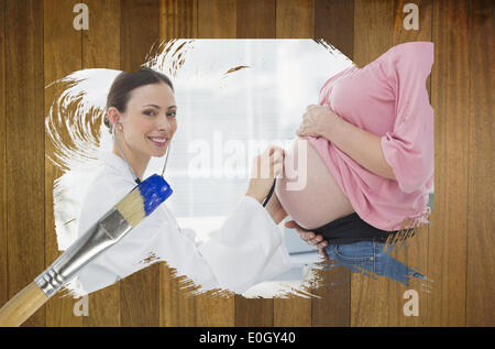 Image composite de femme enceinte à vérifier avec votre médecin Banque D'Images