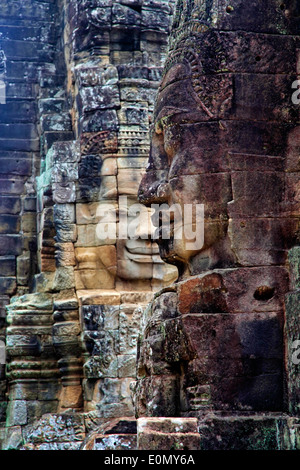 Peintures murales et de sculptures en pierre de temple Bayon d'Angkor Thom. Cambodge Banque D'Images