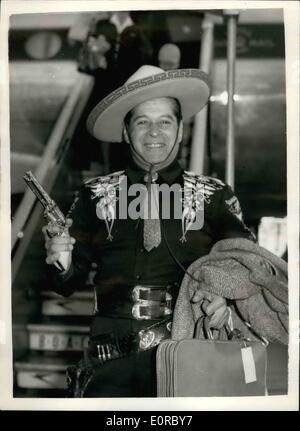 Le 12 décembre 1958 - Le Cisco Kid arrive. Le Cisco Kid - de son vrai nom Duncan Renaldo - arrivée à l'aéroport de Londres ce matin. Il apparaît dans l'émission de télévision Rediffusion ''Lucky'' ce soir. Photo : Keystone montre le Cisco Kid en photo à son arrivée à l'aéroport de Londres ce matin. Banque D'Images