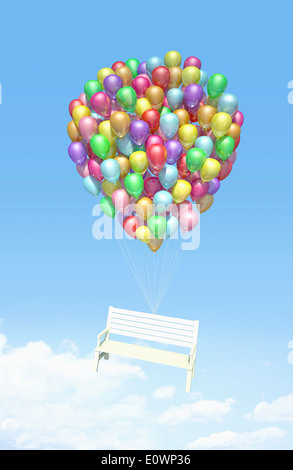 Plusieurs ballons de soulever une chaise parc Banque D'Images