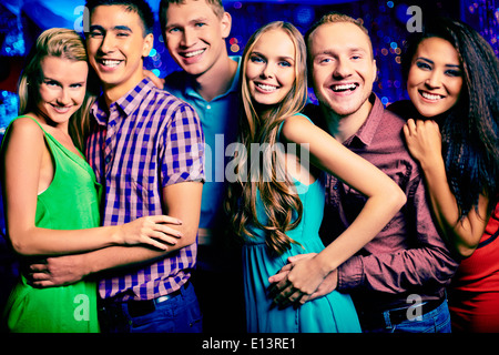 Portrait of happy friends looking at camera at party Banque D'Images