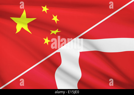 Drapeaux de Chine et au Royaume du Danemark dans le vent. Partie d'une série. Banque D'Images