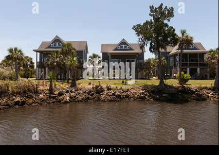 Séance maisons sur pilotis les pilotis dans Crystal River, en Floride. Banque D'Images