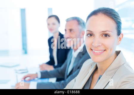 Portrait of smiling businesswoman in meeting Banque D'Images