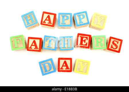 Jouet enfant orthographe majuscules d'heureux pères jours over white Banque D'Images