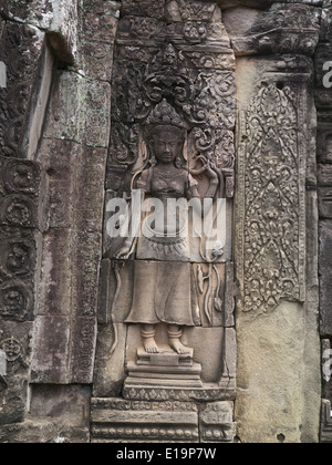 Cambodge Angkor Thom partie d'Angkor Wat temple complexe. Bas-relief de la vie quotidienne au 12e siècle Banque D'Images