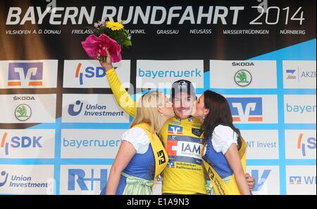 Document - un document image fournie par Henning Angerer/Bayern-Rundfahrt/dpa montre cycliste australienne de Heinrich Haussler l'IAM Cycling Team qui célèbre sur le podium après avoir remporté la première étape du Tour de Bavière 2014 de Vilshofen à 7547. Photo : Henning Angerer/Bayern-Rundfahrt/dpa : Image dans le cadre de l'actuelle déclaration obligatoire : Crédit photo : Henning Angerer/Bayern-Rundfahrt/DPA - Banque D'Images