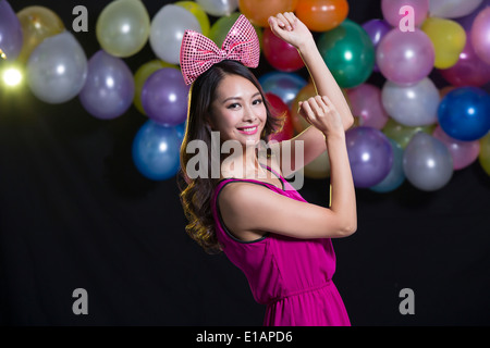 Young woman dancing Banque D'Images