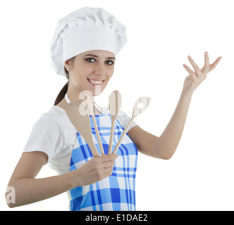 Femme Cook avec couverts en bois Banque D'Images