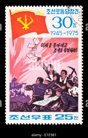 Timbre-poste à partir de la Corée du Nord représentant les travailleurs de la Corée du Sud d'émeutes. Banque D'Images