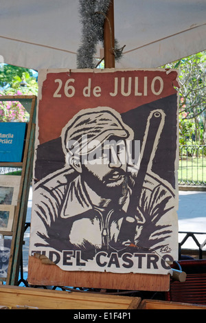 L'un des nombreux bookstalls littérature vente et des affiches à propos de la révolution cubaine dans la Plaza de Armas, la vieille Havane, Cuba. Banque D'Images