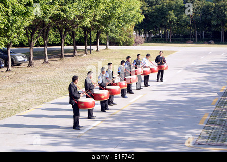 La communauté chinoise security guard la batterie dans la pratique Banque D'Images