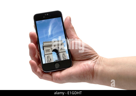 L'IPHONE 5S dans la main isolé sur fond blanc Banque D'Images