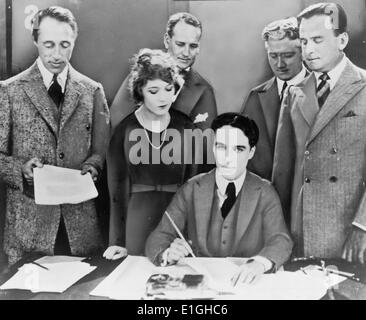 DW Griffith, Mary Pickford, Charlie Chaplin, Douglas Fairbanks signature contrat établissant United Artists motion picture studio Banque D'Images