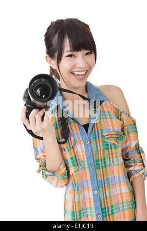 Smiling asian woman with photo caméra Banque D'Images