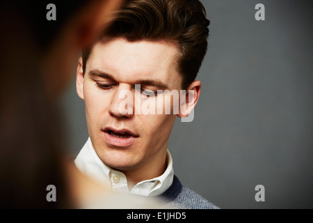 Candid portrait of young man close up Banque D'Images