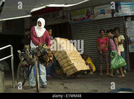 Negros Oriental, DUMAGUETE, PHILIPINS. 27 mai, 2014. Une vie quotidienne dans la ville de Dumaguete le 27 mai 2014. Dumaguete est une ville dynamique située à environ 650 km au sud de Manille, la capitale des Philippines.Arorizo ARORIZO © Armando ARMANDO/Prensa Internacional/ZUMAPRESS.com/Alamy Live News Banque D'Images